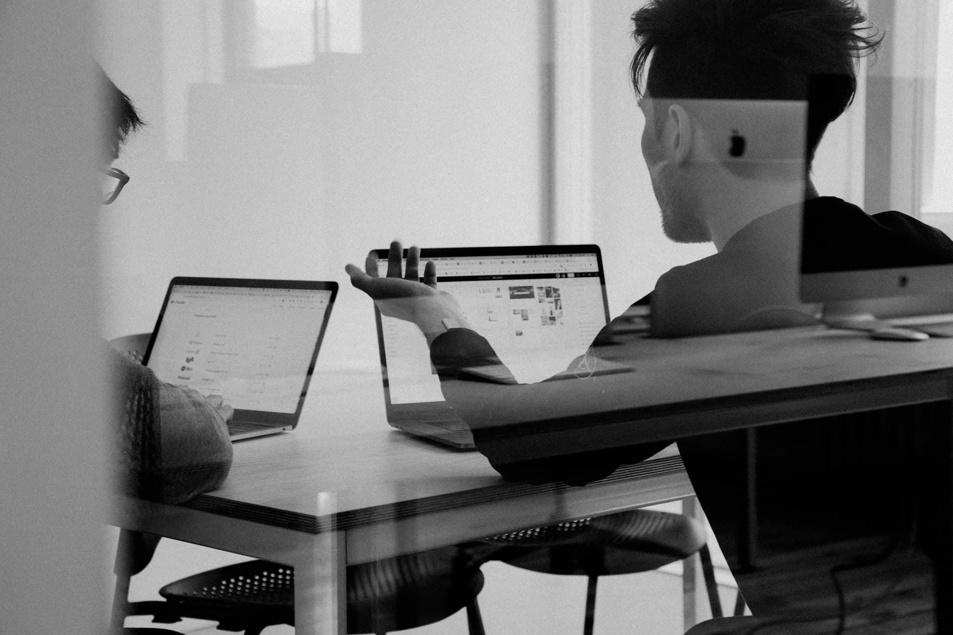 Strategy session mapping workflows on a whiteboard